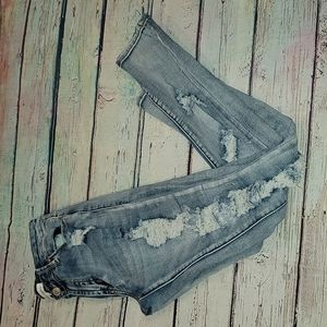 Blue skinny distressed jeans